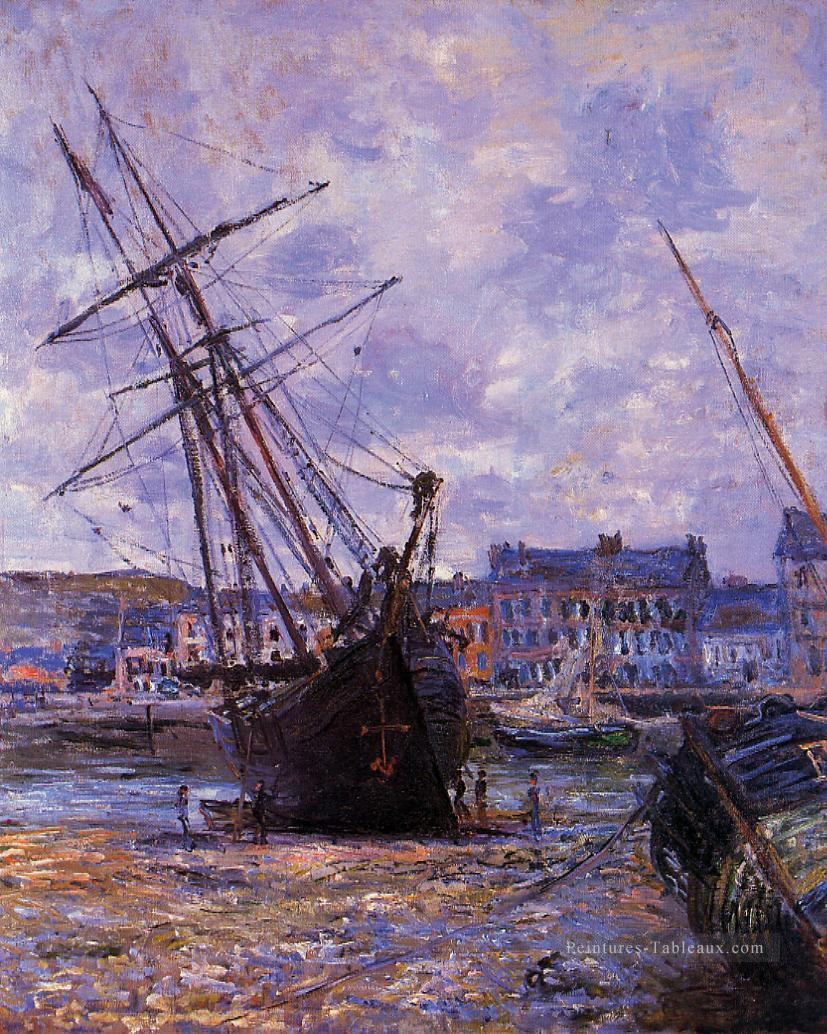 Bateaux couchés à marée basse à Facamp Claude Monet Peintures à l'huile